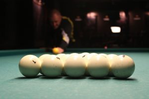 person playing pool